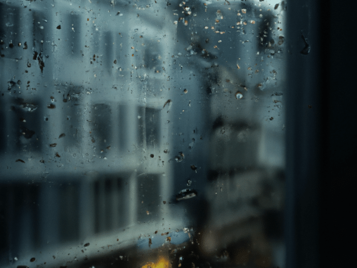 rain falling on window and windowsill